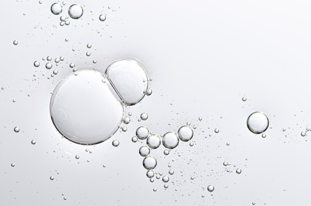 Clear salicylic acid BHA serum texture with bubbles